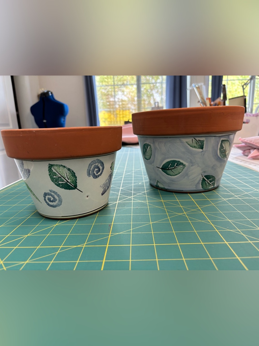 Set of 2 Italian terra cotta pots with painted designs from Vaserie Trevigiane